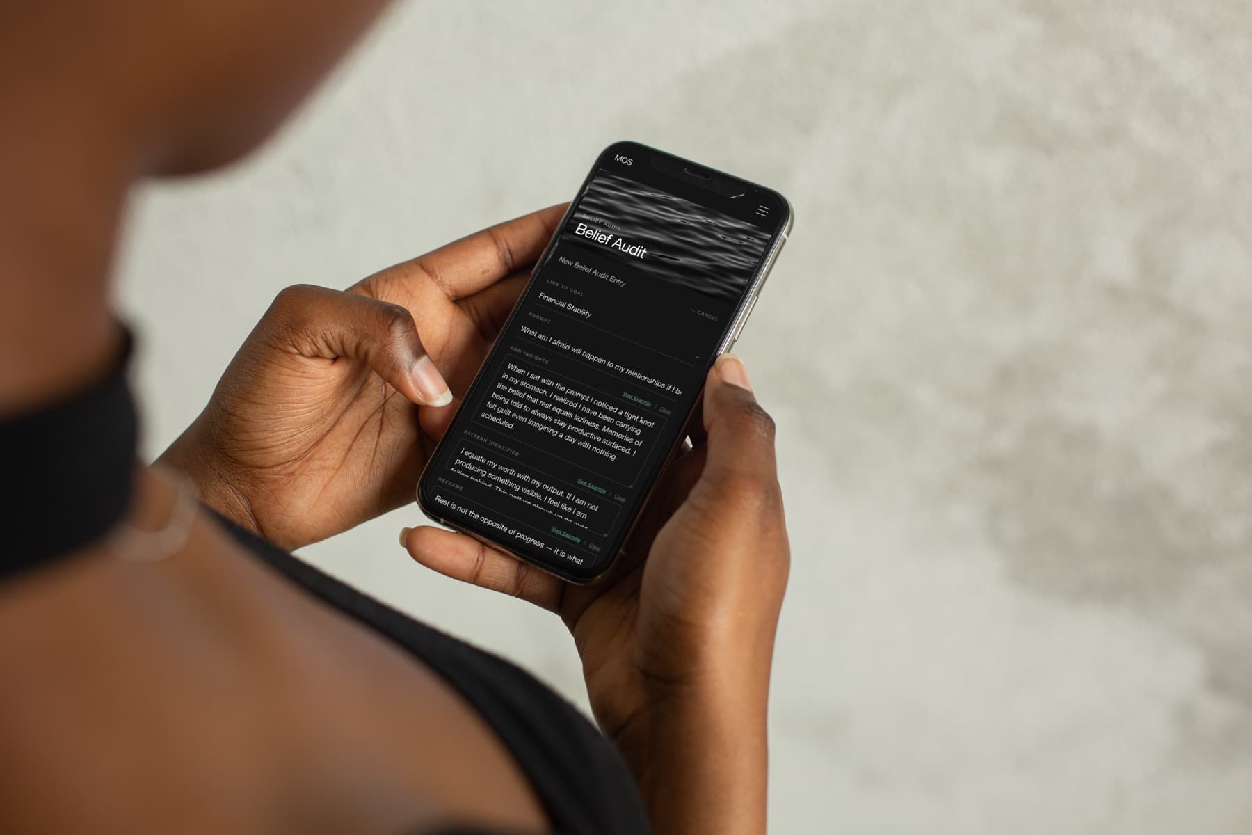 Person checking progress updates on a phone